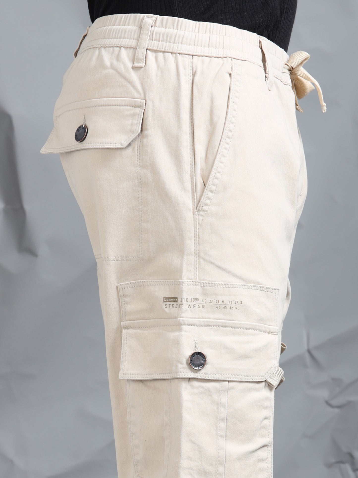 Cotton Lycra Sand  Mid Rise Cargo Pant with 7 Pockets  Drawstring Closure